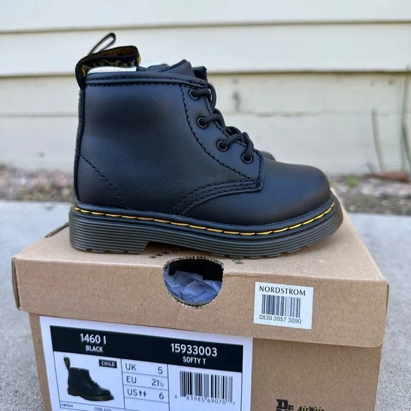 Dr. Martens toddler size 6 black boots. Brand new, never worn.